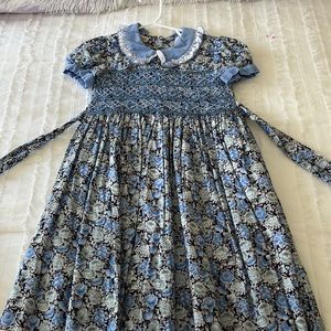 Dress with corduroy collar and sleeves. Smocked